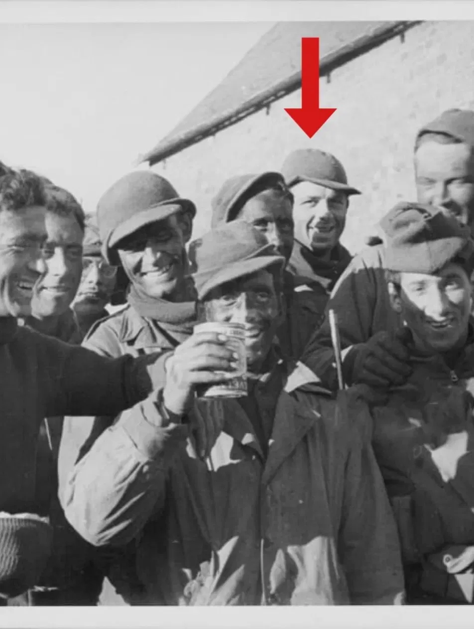 Everett Schafer (indicated by the arrow) among the men of Task Force Hogan after the Marcouray breakout